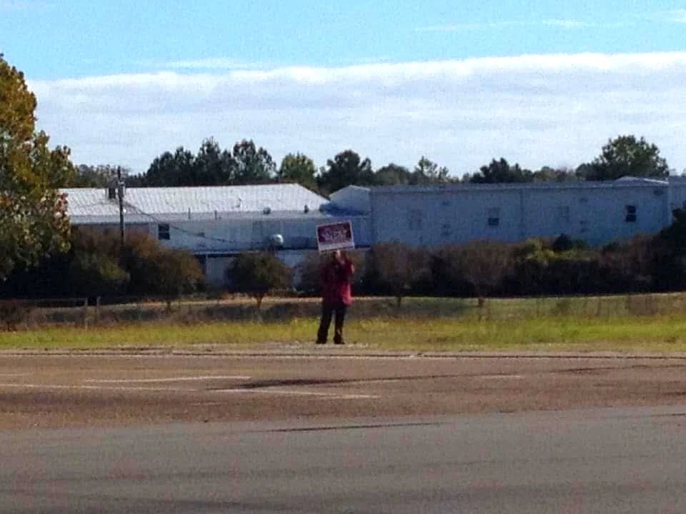 The woman who held Matt Wilson’s campaign sign beside the road during his 2013 special election